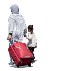 mother and daughter with suitcase walking