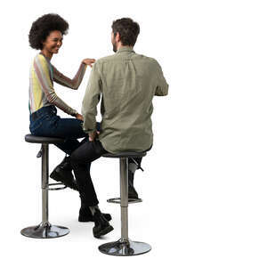 cut out man and woman sitting in a bar and talking