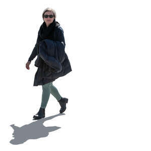 cut out backlit woman in early spring walking