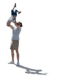 cut out backlit man playing with his son