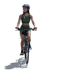 cut out backlit sporty woman riding a bike