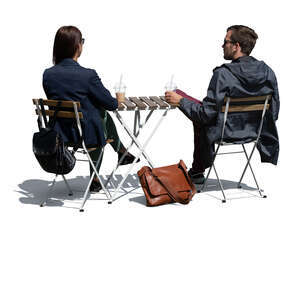 cut out man and woman sitting in a coffeeshop