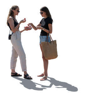 two cut out women standing and eating strawberries