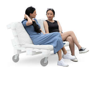 two cut out women sitting on the sofa and talking