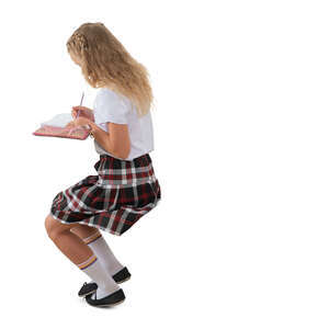 cut out schoolgirl sitting and writing