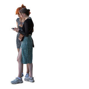 two cut out teenage girls standing and talking