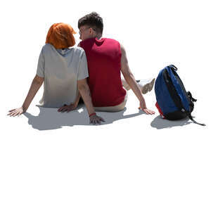 cut out backlit young teenage couple sitting