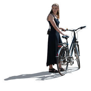 cut out backlit woman with a bike standing and looking back over her shoulder