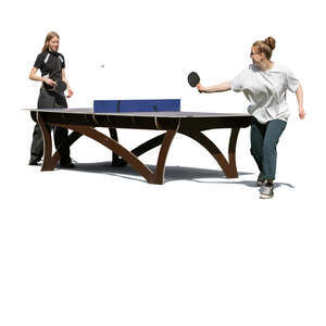 two cut out young women playing table tennis outside