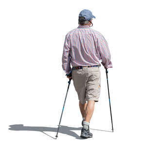 cut out older man with two nordic walking sticks walking