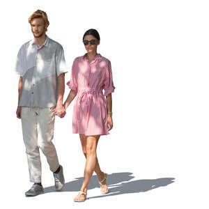 cut out man and woman walking hand in hand in partial sunlight