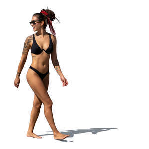 cut out woman in bikini walking on the beach