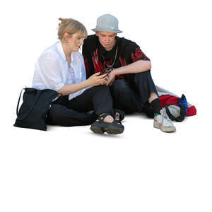 cut out man and woman sitting on the ground and watching smth from a smartphone