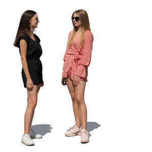 two cut out young women standing and talking