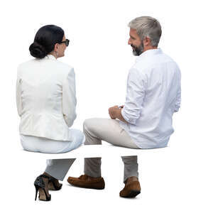 man and woman sitting and talking seen from back angle