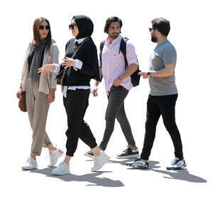 group of backlit young middle eastern people walking