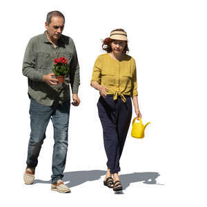 two older people going to plant flowers in the garden