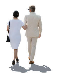 cut out backlit couple in white summer party clothes walking arm in arm