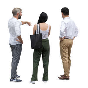 three people standing and looking at smth