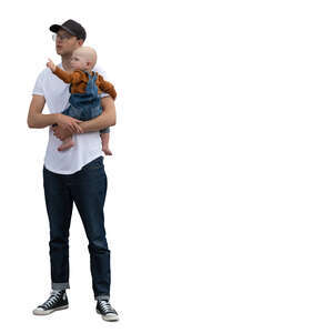 man holding a small child and looking up at smth