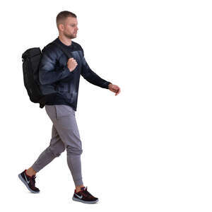 cut out sporty man with a backpack walking