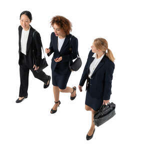 cut out top view of three businesswomen walking