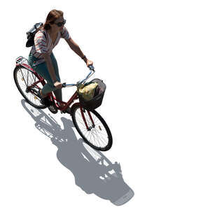 top view backlit cut out woman riding a bike