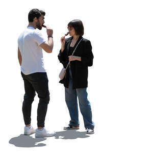 cut out backlit man and woman standing and eating ice cream