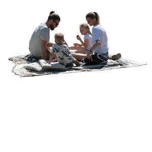 cut out backlit family having a picnic outside