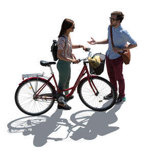 backlit top view image of woman with bicycle talking with a man