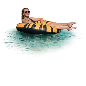 cut out woman relaxing on the large floatie in the pool