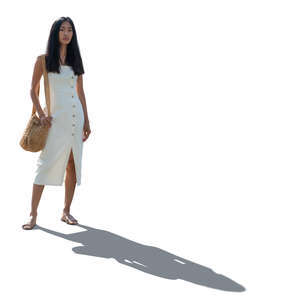 cut out backlit asian woman in a white summer dress standing