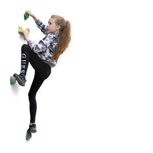 girl rock climbing on a climbing wall