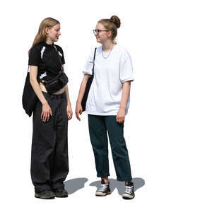 two teenage girls standing and talking