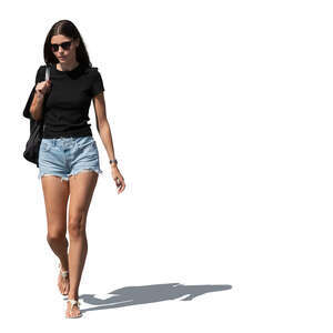 woman in denim shorts walking