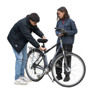 man helping his friend to adjust her bike 