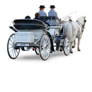 cut out people riding in a fancy horse carriage