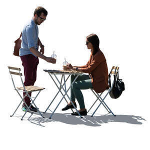 backlit scene of a casual coffeeshop with two people