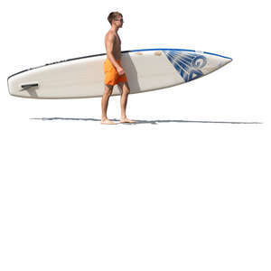 man with a paddle board walking on the beach