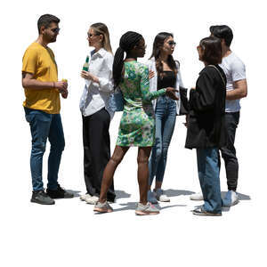 group of young people standing and drinking and talking