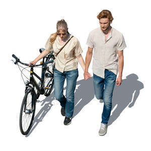 man and woman with a bicycle walking hand in hand