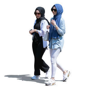 two cut out young muslim women walking