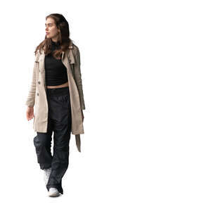 cut out latin woman in a trenchcoat walking