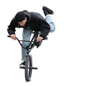 young man doing stunts on a bmx bike