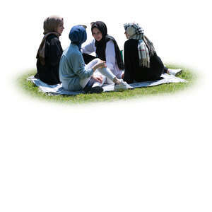 cut out group of muslim girls having a picnic on the grass