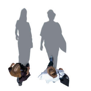 top view of two cut out women walking