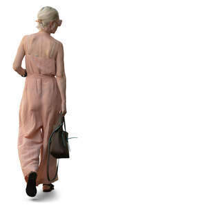 cut out woman in a light summer jumpsuit walking