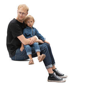 man sitting with her daghter on his lap