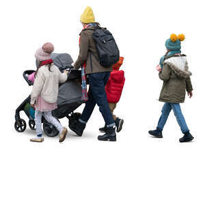 woman with three kids and a stroller walking