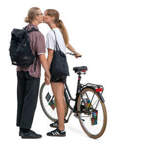 woman with a bike standing and kissing her boyfriend